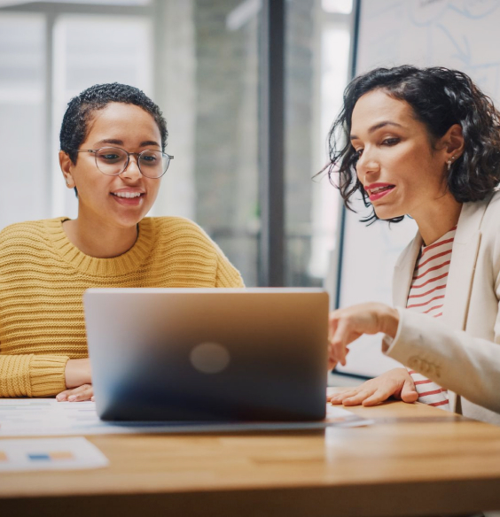 Two Business People Working and Talking