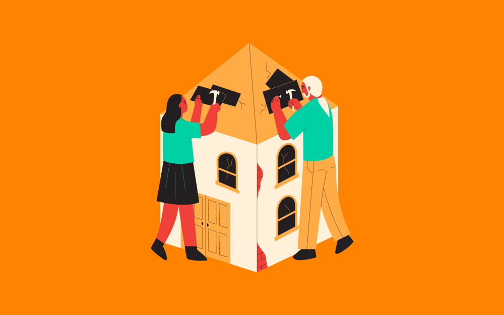Orange background with two people working on a broken house.